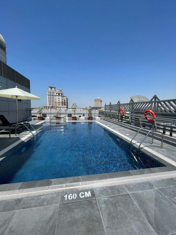 Mena Aparthotel Albarsha 4*