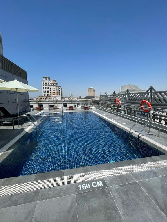 Mena Aparthotel Albarsha 4*